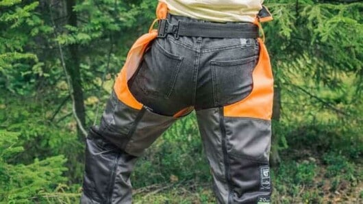 Chainsaw Pants vs. Chaps: Pros And Cons Of The Safety Gears 2 man wearing chainsaw chaps